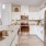 a kitchen with white cabinets