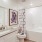 a bathroom with a tub toilet and sink