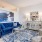 a clubhouse room with a blue couch